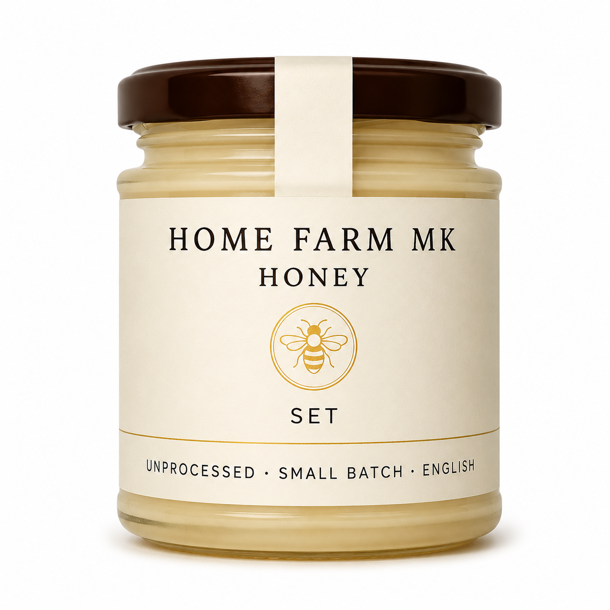 A glass jar of Home Farm Mk Honey with a cream-colored label and a dark brown lid, set against a plain white background.