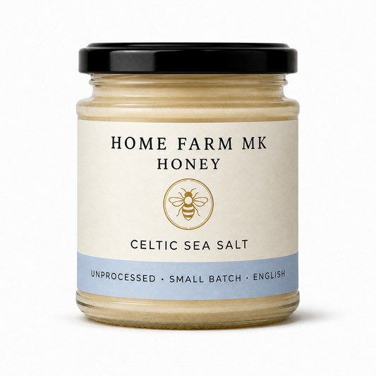 Home Farm MK Celtic Sea Salt English Honey jar without a tamper band, on a clean white background.