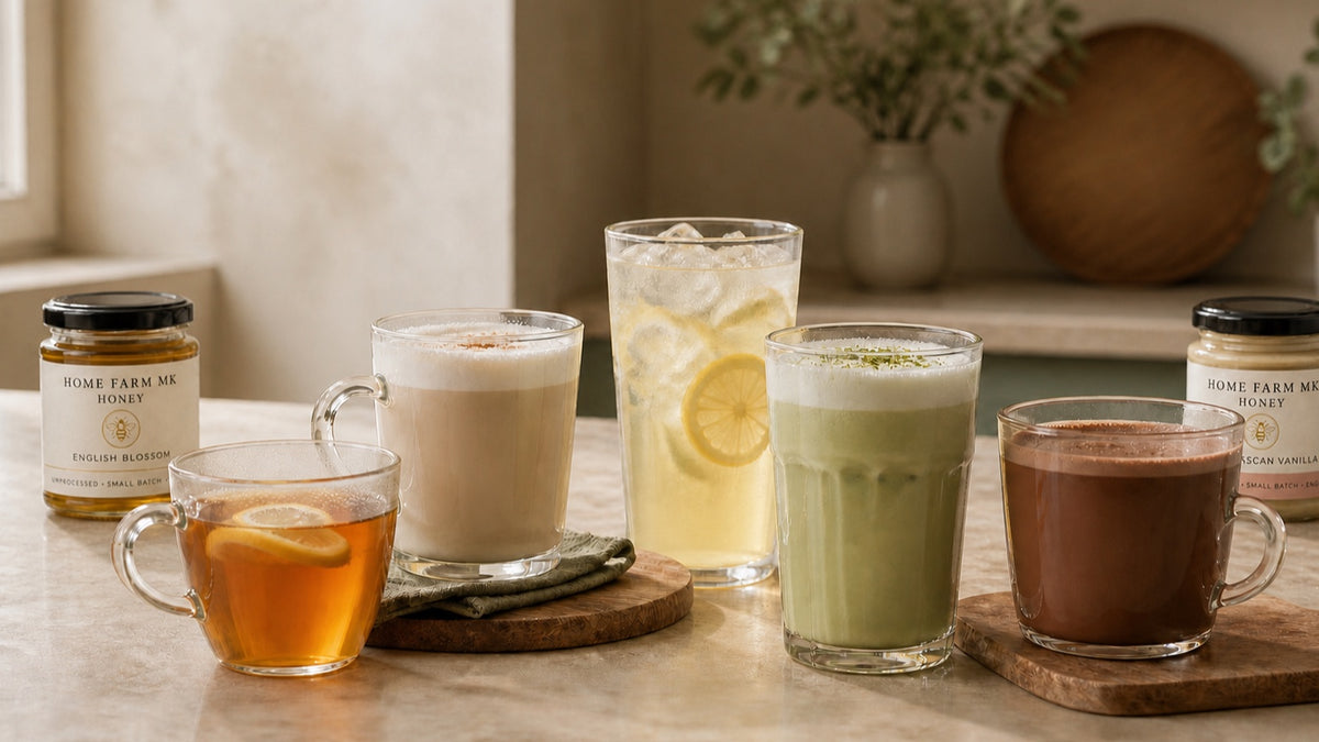 A selection of hot and cold honey drinks with Pure English and Vanilla Honey jars.